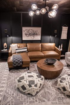 a living room filled with lots of furniture and decor on top of carpeted flooring