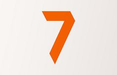 the number seven is shown in orange on a white background with an arrow pointing up