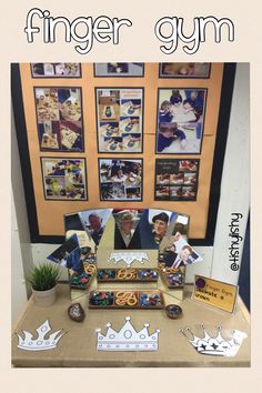 a table topped with doughnuts covered in frosting and surrounded by pictures on the wall