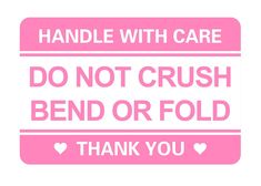 a pink and white sign that says, handle with care do not crush bend or fold thank you