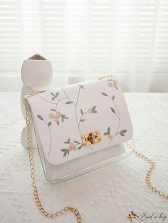 BirdinBag - Clear Square Bag with Flower Embroidery and Twist Lock Flap Spring Rectangular Shoulder Bag With Floral Embroidery, Spring Floral Print Crossbody Bag, Floral Embroidered Satchel Bag For Everyday, Floral Embroidered Satchel For Everyday Use, Floral Embroidered Satchel For Daily Use, Spring Floral Embroidered Shoulder Bag, Spring Floral Embroidery Shoulder Bag, White Floral Print Flower Shaped Shoulder Bag, White Floral Print Flower-shaped Shoulder Bag