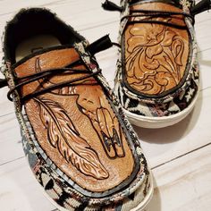 Walk with a western flair in these fully custom Hey Dudes! These custom Dudes are hand drawn and hand tooled from start to finish to fit your personality and style requests. Got a very specific request? No worry, I tool it all! You will choose your preferred shoe style from available stock (up to 59.95 in price) at heydudeshoesusa.com Client will also be provided a hand drawn mock before tooling for approval. During this step client can request changes to design if needed. Typical shop TURN AROU Western Hey Dudes, Cute Hey Dudes, Custom Hey Dudes, Leather Goodies, Country Shoes, Leather Working Patterns, Steer Skull, Western Shoes, Hey Dude Shoes