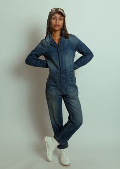 NOEND Denim's Yanni Jumpsuit Jean features a concealed button front, cropped straight leg, long sleeves and front pockets. Details: Concealed button front. Minimal distressed details. Long sleeves. Slash pockets. Straight, cropped leg. Machine wash cold inside out. Line dry. Made in USA. Color denim. 100% cotton. Jumpsuit Jean, Pockets Details, Dream Fashion, Slow Fashion Movement, Jean Overalls, Holiday Party Outfit, Athleisure Outfits, Long Jumpsuits, Jeans Outfit