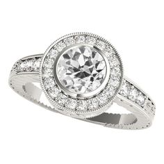 a white diamond ring with diamonds around it