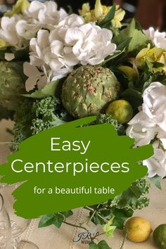 an easy centerpiece for a beautiful table with flowers and greenery in the center