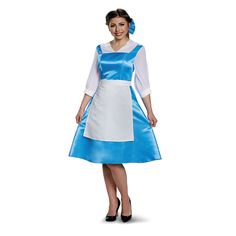 a woman in a blue and white dress is standing with her hands on her hips