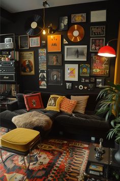 a living room filled with lots of furniture and pictures on the wall above it's couch