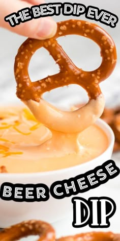 a person dipping cheese into a bowl with pretzels in it and the words, the best dip ever beer cheese dip