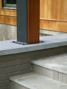 a wooden podium sitting on top of cement steps