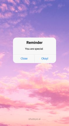 an iphone screen with the text reminder you are special close okay in front of a pink and blue sky