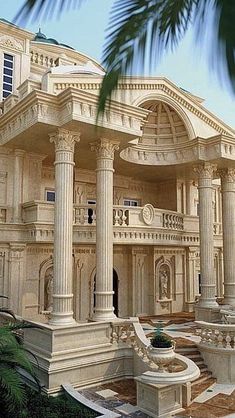 a large white building with columns and arches