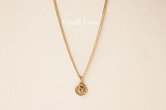 DETAILS • Single Coin Necklace• Choose between the small coin chain or the medium coin chain• 18k Gold Filled• Tarnish Resistant• Chain Length: 18" with 1" extender• Small Coin Size: 12mm x 15mm• Medium Coin Size: 15mm x 18mm GOLD FILLED •Our Gold filled jewelry has an outer layer of 14k or 18k gold that is pressure bonded to a base metal of jewelers brass. •This type of jewelry is made for everyday use of stacking or layering. • This type of jewelry can withstand normal body sweat, body oils, a 14k Gold Coin Pendant Necklace For Everyday, Everyday 14k Gold Coin Necklace, Everyday Minimalist Coin Necklace, Classic Gold Plated Coin Necklace, Everyday Gold-plated Coin Necklace, Everyday Gold Plated Coin Necklace, Minimalist Gold Plated Coin Necklace, Heavy Sweating, Body Sweat