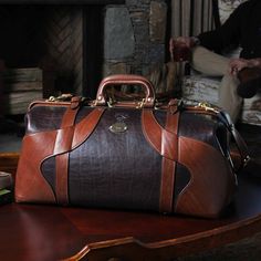 This American Buffalo Travel Grip Bag is a rugged, easy-to-pack, vintage-style duffle. Leather Garment Bag, Gladstone Bag, Luxury Travel Bag, American Buffalo, Usa Bag, Leather Company, Leather Duffle Bag, Leather Travel Bag, Leather Duffle