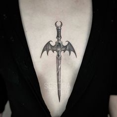 Bat Dagger Tattoo, Sternum Tattoo Dagger, Dagger Sternum Tattoo Women, Gothic Dagger Tattoo, Dagger Chest Tattoo Female, Dagger Tattoo Design, Grunge Tattoos, Grunge Tattoo, Goth Tattoo