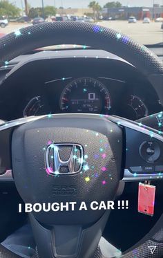 the interior of a honda car with sparkles on it's dash board and steering wheel