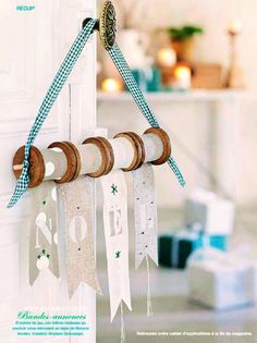 the door is decorated with ribbons and wooden knobs as well as other decorative items