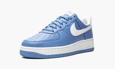 The Nike Air Force 1 Low “University Blue” is a colorway of the retro basketball shoe that looks to the popular “UNC” theme that originated on the Air Jordan 1 in 1985 for design inspiration.  A Fall 2021 release by Nike, the “University Blue” is reminiscent of the brand’s late ‘90s and early 2000s Air Force 1 and Dunk colorways that also appeared in “University Blue�” or “Powder Blue. ” Here, the entire upper, including the perforated toe, mid-panel, collar, and heel, appear in University Blue-c Dunk Colorways, Unc Shoes, Sneaker Displays, Sneakers Box, Kobe Shoes, Retro Basketball Shoes, Retro Basketball, Marina Blue, Mens Nike Shoes