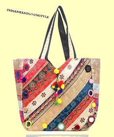 Experience the elegance of traditional Indian craftsmanship with this 100% comfortable cotton tote bag, embroidered with Resham Dori in an exquisite Rajasthani style. Made from premium cotton silk, this multicolored bag embodies the vibrant essence of Jaipuri Bohemian art. Perfect for any occasion, its versatile design allows you to pair it with a wide range of outfits. With one exterior and one interior compartment, this handcrafted bag offers both style and functionality, making it a must-have accessory. pack of = assorted colors & Designs. - **Material 100% Comfortable Cotton and Cotton Silk blend for durability and comfort. - **Embroidery Intricate Resham Dori embroidery showcasing traditional Rajasthani craftsmanship. - **Design Vibrant Jaipuri Bohemian art, rich in multicolor pattern Traditional Cotton Shoulder Bag For Daily Use, Bohemian Multicolor Embroidered Cotton Shoulder Bag, Bohemian Cotton Shoulder Bag With Multicolor Embroidery, Bohemian Shoulder Bag With Multicolor Embroidery, Traditional Cotton Tote Shoulder Bag, Traditional Multicolor Cotton Bag, Traditional Embroidered Shoulder Bag For Navratri, Bohemian Multicolor Cotton Canvas Bag, Bohemian Cotton Bag With Multicolor Embroidery