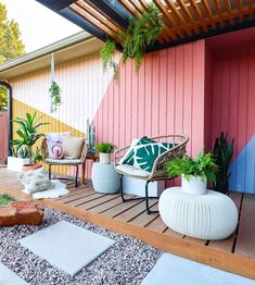 an outdoor patio with plants and potted plants