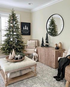 a living room filled with furniture and a christmas tree