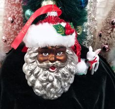 a close up of a statue of santa claus