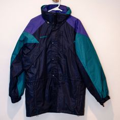 Columbia Vintage 90s Retro Color Block Williwaw 3-In-1 Ski Jacket Reversible -Retro Color Block -Complete 3-In-1 Jacket -Interior Insulated Jacket Is Removable As Well As Reversible -Packable Hood -Vented Arm Pits -Multiple Pockets All Over Interior And Exterior Of Jacket -Velcro Cuffs -Full Zipper/ Snaps Color: Black/Purple/Green Hard To Capture True Colors - Teal Is More Of A Green Hue Size: Men's Medium Condition: Preowned In Great Condition, Only Worn A Handful Of Times And Has Been Sitting In A Closet! Measurements: Length: 32" Waist: 23.5 Arm Inseam: 28" Pit To Pit: 26" Closet Measurements, Arm Pits, 3 In 1 Jacket, Ski Jacket Mens, Columbia Blue, 90s Retro, Columbia Jacket, Retro Color, Ski And Snowboard