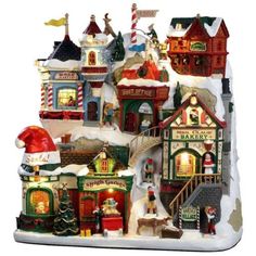 a christmas village with santa's sleigh and other holiday decorations