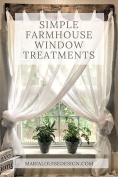 the window is decorated with white curtains and potted plants