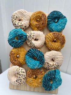 a bunch of doughnuts that are on a board