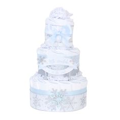 three tiered diaper cake with snowflakes and bows on it's sides