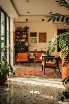 a living room filled with furniture and lots of plants