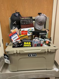 a cooler filled with hats and other items