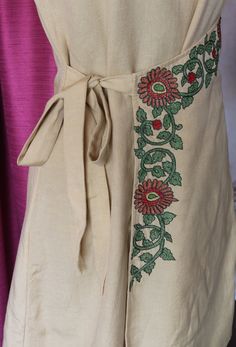 "Dress for women, Beige linen dress, Tie-up dress, Shift dress, Made to order, Custom made, Plus size -Model height: 5'3\" wearing size S -Length: 35\" The motif used is kalamkari motif. Kalamkari is an ancient style of hand painting done on cotton or silk fabric with a tamarind pen, using natural dyes. The floral embroidery on the front is done in a special kind of hand embroidery technique from North India called maggam. Known to be one of the most ancient and traditional type of intrinsic art Traditional Embroidered Linen Dress, Beige Linen Tunic Dress, Diy Dress Pattern, Beige Linen Dress, Stitch Videos, Shirt Gown, Robe Diy, Saree Painting Designs, Tie Up Dress