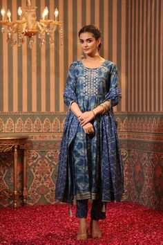 Women's navy muslin silk foil print anarkali suit dress with beads & stones. Anarkali kurta set has gota embellished yoke design and gota border. It come with muslin silk printed slip-on trousers & muslin silk printed dupatta with tassels. 3 Piece Anarkali style Navy blue Long sleeves Muslin silk Straight bottom Elastic waist Printed dupatta Festive wear Dry clean Dispatched 1-3 business days Phulkari Pants, Printed Anarkali Suits, Anarkali Kurta Set, Lucknowi Kurta, Dress With Beads, Yoke Design, Printed Anarkali, Bridal Dupatta, Kurta Dress