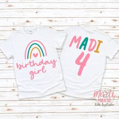 two birthday shirts with rainbows and the words madi, birthday girl on them