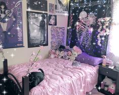 a bedroom decorated in pink and black with pictures on the wall, bedding, and decorations