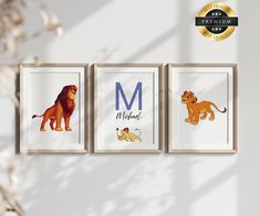 three framed pictures with the letter m, lion and other animals on them in front of a white wall