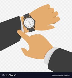 a person holding onto a wrist watch while wearing a suit