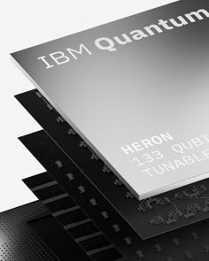 the back side of an ibm quartum logo on four different types of business cards