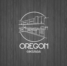 the oregon cocinas logo on a wooden wall