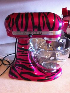 a pink mixer with zebra print on it