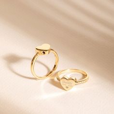 Custom Engrave Memorial Heart Urn Ring, Heart Shaped Mourning Ring, 14K 18K Solid Gold Ash Holder Heart Ring, CZ & Diamond Heart Urn Jewelry Material: Solid Gold, real gold (not gold-filled or no gold plated) Available Gold Karat: 14K (585), and 18K (750) Available Gold Colors: Yellow, rose, and white Available charms to open/close the screw:  wing, cross, key, anchor, bone and hammer Heart Height: 8.50 mm Heart Width: 9.50 mm Band Width: 2.00 mm *Measurements may vary slightly due to handwork. There is a 2 different stones option. (CZ & Diamond) The total number of stones is 12. Total Number of Diamond 12  Total Diamond weight: 0.06 ct Diamond color: GColor Diamond clarity: SI Caring For You Cremation ring: Though this cremation ring opens with a threaded screw, we strongly advise using a Cremation Ring, Mama Necklace, Urn Jewelry, Ring Heart, Urn Necklaces, Cremation Jewelry, Memorial Jewelry, Evil Eye Necklace, Evil Eye Bracelet