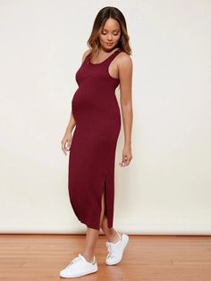 This long knitted sundress is the perfect summer maternity dress for expecting mothers. Made with lightweight and breathable material, it provides comfort and style as your body changes. The dress is designed to flatter your growing belly and can be dressed up or down for any occasion. Casual Ribbed Maternity Dresses, Summer Stretch Maternity Dress, Summer Stretch Maternity Dress Bump Friendly, Summer Stretch Maternity Dress Nursing Friendly, Sleeveless Bump-friendly Maternity Dress, Red Sleeveless Ribbed Dress, Summer Stretch Bump-friendly Dresses, Red Ribbed Sleeveless Dress, Red Maternity Summer Dress