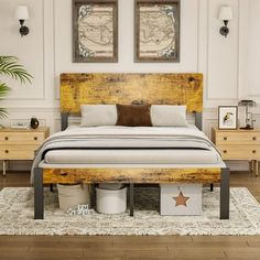 a bed sitting on top of a wooden floor next to two nightstands and a potted plant