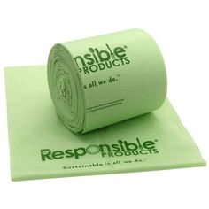 a roll of responsable products sitting on top of a green napkin