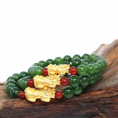 Baikalla Jewelry jade beads bracelet 6.5 inches / Pixiu S 24K Pure Yellow Gold PiXiu With Genuine Green Jade Round Beads Bracelet Bangle ( 9.5 mm ) Affordable Jewelry With Gold Round Beads, Simplistic Design, Jade Jewelry, Jade Beads, Bracelet Bangle, Green Jade, Black Spot, Beads Bracelet, Jade Green