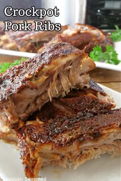 crockpot pork ribs on a plate with parsley