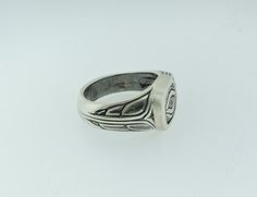 "This ring is modeled after the Haida Raven design among native american art. It has a satin finish and the engraving portions have been oxidized for contrast. This ring is solid Sterling silver and the ring that is pictured is a size 10. This ring is available in any size from 6 to 13 or higher by request. This ring was handmade and hand finished by Daniel Leslie and is his original design. * If you are interested in this ring but you are unsure about your finger size, please contact me and I c Adjustable Symbolic Carved Rings, Artisan Oval Engraved Ring, Symbolic Stamped Collectible Rings, Artisan Stamped Rings As Collectibles, Symbolic Oval Etched Rings, Artisan Engraved Rings For Formal Occasions, Symbolic Etched Oval Engraved Ring, Symbolic Engraved Ring With Oxidized Finish, Symbolic Stamped Oval Rings