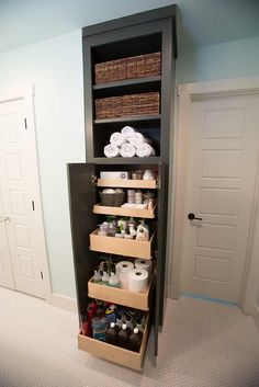 the bathroom is organized and ready to be used as a storage unit for toiletries