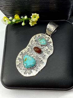 "Artisan Turquoise and Mexican fire Opal pendant Hand-made Sterling Silver 925. Stones used: Turquoise (Nevada), Mexican Fire Opal. Height -3\" (including bail), Width - 1 1/4\" Height - 75mm (including bail), Width - 35mm Unique Handcrafted One-of a-kind Design Pendant Each Piece of Jewelry in my Collection is Absolutely One of a Kind! When you start wearing a piece of my jewelry you will fall in love with it more and more each day and feel that good Energy and Love that I pass into it while cr Unique Untreated Turquoise Necklace Gift, Turquoise Pendant In Sterling Silver, Turquoise Sterling Silver Pendant Gemstone, Unique Untreated Turquoise Necklace As Gift, Turquoise Pendant Gemstone In Sterling Silver, Unique Untreated Turquoise Necklace For Gift, Turquoise Natural Stones Pendant Gemstones, Turquoise Pendant Gemstone, Turquoise Natural Stone Pendant